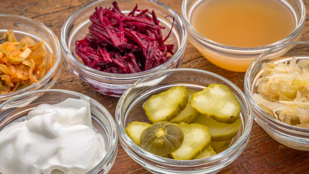Small bowls of yogurt, pickles, and more
