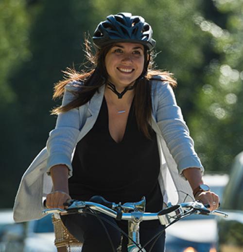young woman riding bike