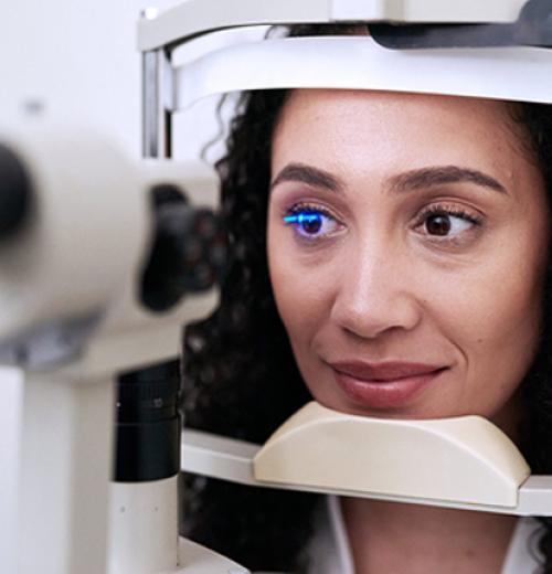 Woman getting eye exam